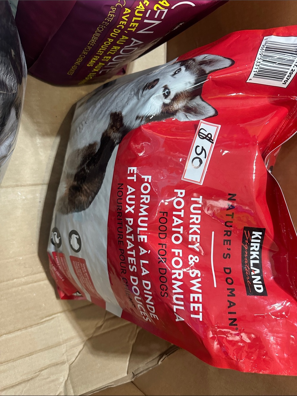 Kirkland Signature Red Pet Food Bag with Dog Illustration